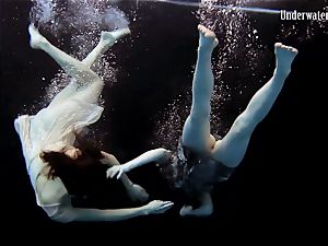 two damsels swim and get nude spectacular